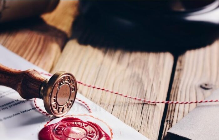 Notary seal with red wax on a document – symbol of company formation and legal certification in Turkey | Falke Law Tax